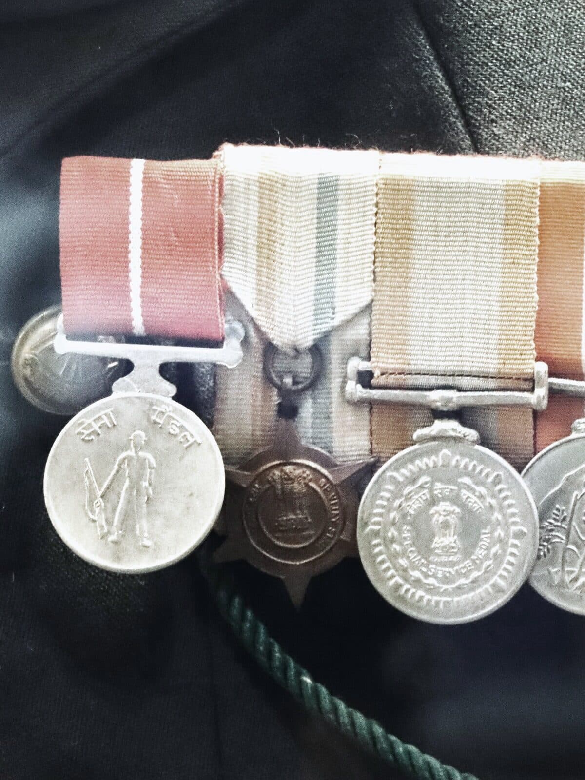 Indian Army service medals mounted on the breast of a dress uniform, the wearer out of frame